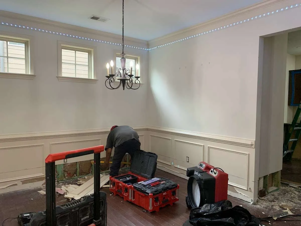 Restoration technician with professional equipment in Swampscott